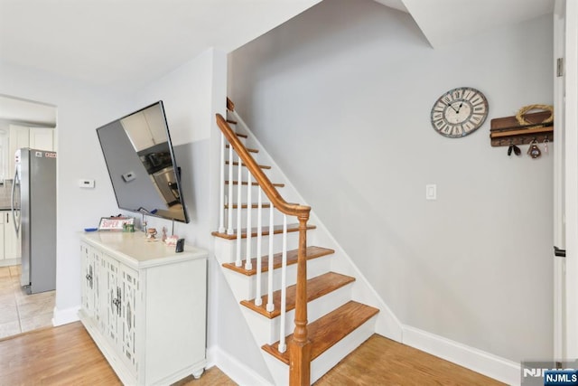 520 Elm St, Roselle Park, NJ 07204 - staircase with baseboards and wood finished floors