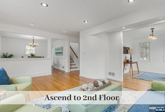 370 Chesterfield St, Ridgewood, NJ 07450 - living room with wood finished floors, a chandelier, recessed lighting, and stairs
