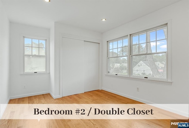 370 Chesterfield St, Ridgewood, NJ 07450 - unfurnished bedroom with baseboards, wood finished floors, a closet, and recessed lighting