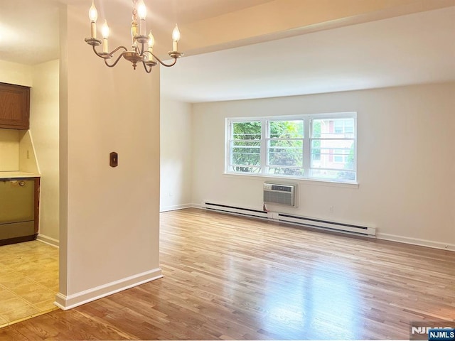 109 N Maple, Park Ridge, NJ 07656 - empty room with light wood finished floors, a chandelier, an AC wall unit, baseboards, and a baseboard radiator