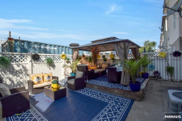 127 Brill St, Newark, NJ 07105 - view of patio / terrace with outdoor lounge area, a gazebo, a fenced backyard, and central air condition unit