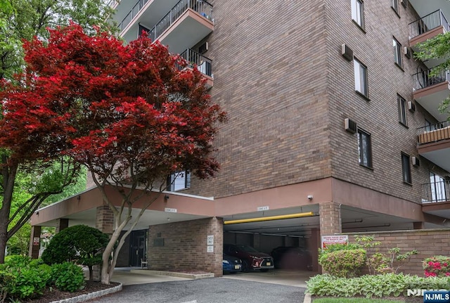 view of property with covered parking