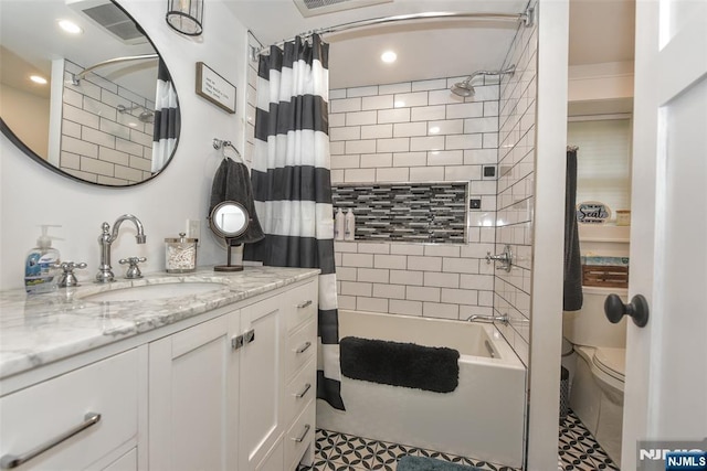bathroom with shower / bath combo, vanity, recessed lighting, and toilet
