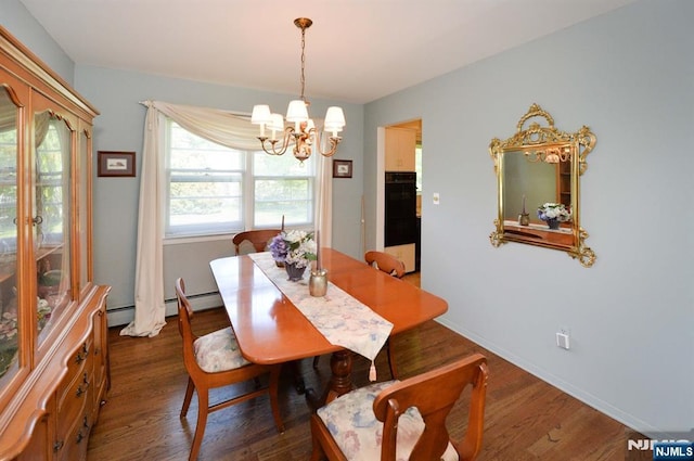 36 Joyce Ln, Wayne, NJ 07470 - dining space featuring a chandelier, wood finished floors, and baseboards