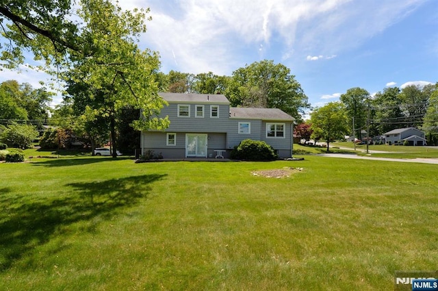 36 Joyce Ln, Wayne, NJ 07470 - rear view of house with a lawn