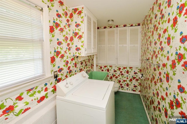 36 Joyce Ln, Wayne, NJ 07470 - laundry room featuring washer / dryer, wallpapered walls, cabinet space, and baseboards