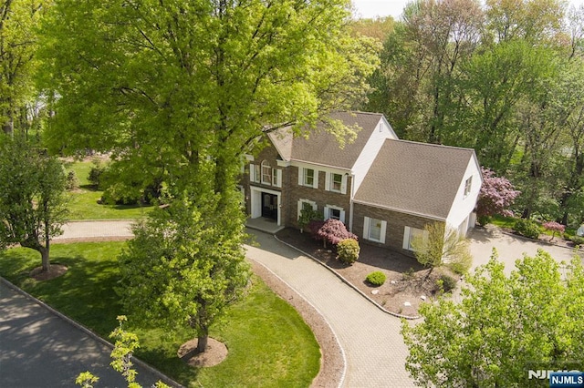 view of front of home with stone siding