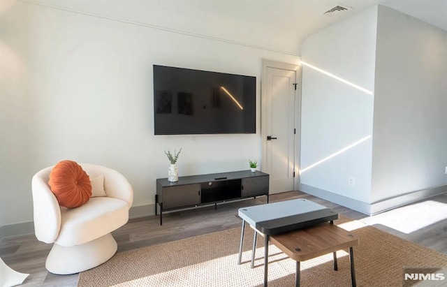 6115 Kennedy Blvd, West New York, NJ 07093 - living room featuring wood finished floors and baseboards