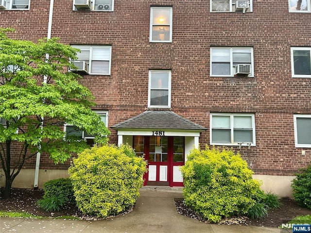 1481 E Terrace Cir Unit 4, Teaneck, NJ 07666 - doorway to property with brick siding