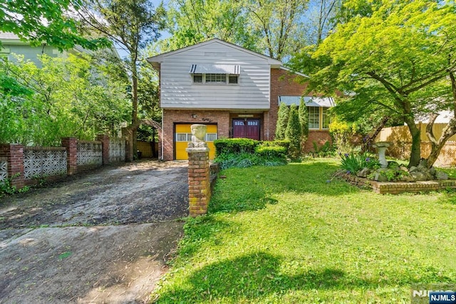 86 Fairview Ave, Teaneck, NJ 07666 - view of front facade featuring brick siding and asphalt driveway