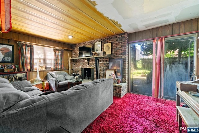 86 Fairview Ave, Teaneck, NJ 07666 - living area featuring wooden walls, a fireplace, and wooden ceiling