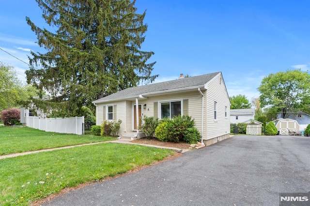 6 Glen Ave, Mine Hill Township, NJ 07803 - view of front of property featuring a storage unit, a chimney, and an outdoor structure