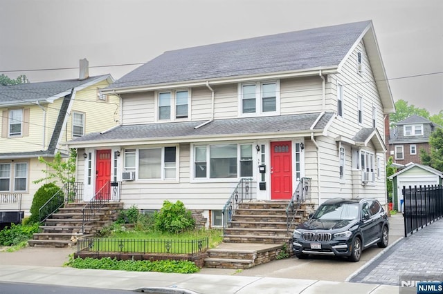 376-378 Columbia Ave, Cliffside Park, NJ 07010 - view of front of property featuring entry steps, an outbuilding, roof with shingles, and cooling unit