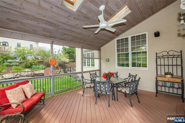 39 Crown View Ct, Sparta, NJ 07871 - sunroom / solarium featuring a skylight, vaulted ceiling, outdoor dining space, ceiling fan, and an outdoor living space