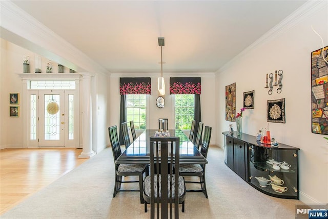 39 Crown View Ct, Sparta, NJ 07871 - carpeted dining room featuring ornamental molding, decorative columns, baseboards, and wood finished floors