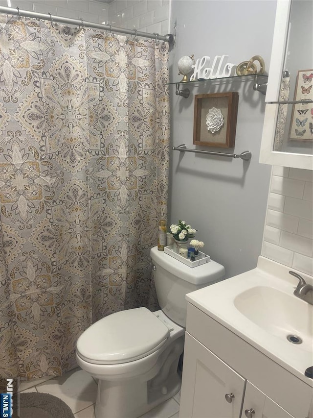 154 Butler St, Paterson, NJ 07524 - bathroom with vanity, tile patterned floors, toilet, and curtained shower