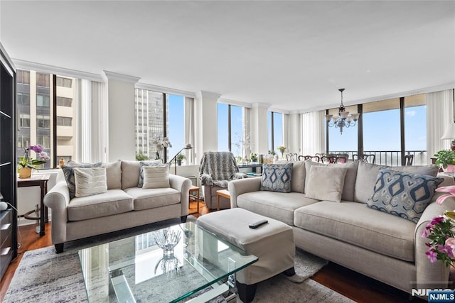 300 Winston Dr Unit 1817, Cliffside Park, NJ 07010 - living area with healthy amount of natural light, wood finished floors, a chandelier, and floor to ceiling windows