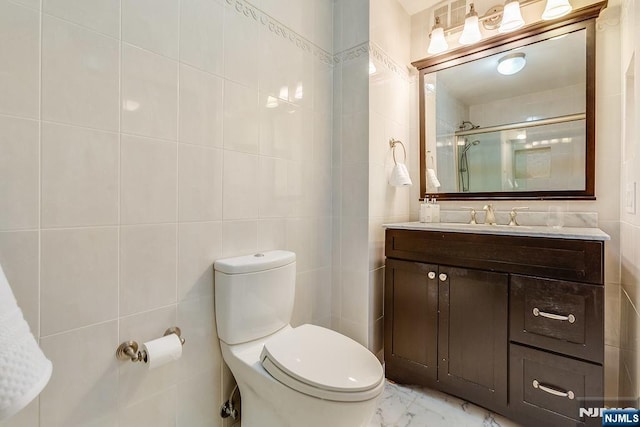 300 Winston Dr Unit 1817, Cliffside Park, NJ 07010 - bathroom with tile walls, vanity, toilet, a shower with door, and marble finish floors