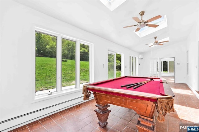 11 Deer Meadow Rd, Warwick, NY 10990 - rec room featuring a skylight, a baseboard radiator, tile patterned flooring, a ceiling fan, and lofted ceiling