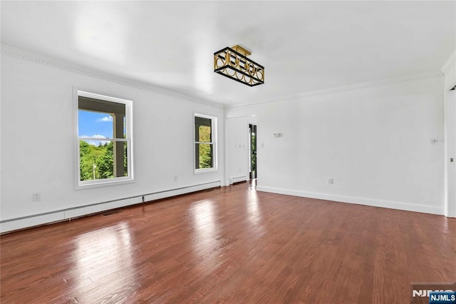 11 Deer Meadow Rd, Warwick, NY 10990 - empty room featuring crown molding, a baseboard heating unit, wood finished floors, and baseboards
