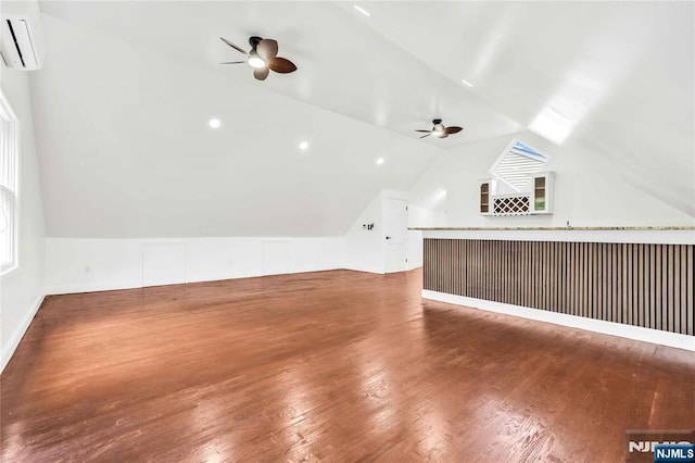 11 Deer Meadow Rd, Warwick, NY 10990 - additional living space featuring a wall unit AC, ceiling fan, vaulted ceiling, wood finished floors, and baseboards