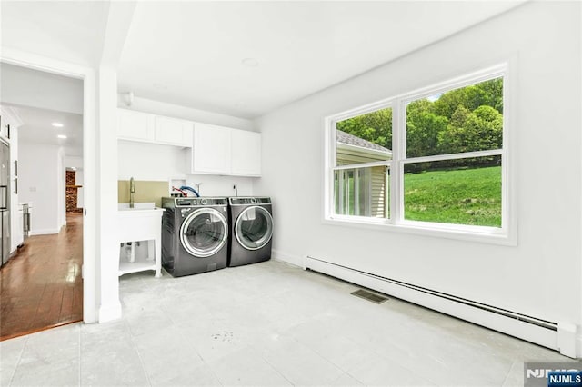 11 Deer Meadow Rd, Warwick, NY 10990 - washroom featuring cabinet space, washer and dryer, baseboard heating, baseboards, and recessed lighting