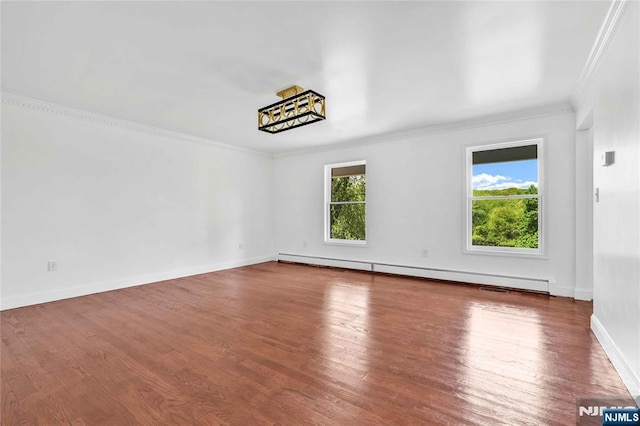 11 Deer Meadow Rd, Warwick, NY 10990 - unfurnished room with baseboard heating, crown molding, wood finished floors, and baseboards
