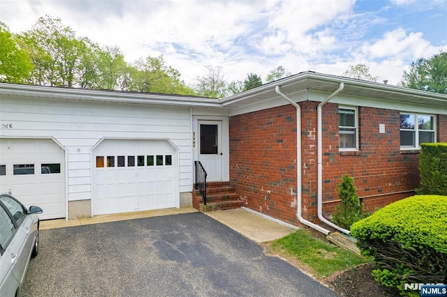 474 Laurel Brook Dr, Brick, NJ 08724 - single story home featuring entry steps, driveway, an attached garage, and brick siding