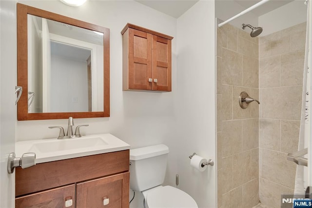 474 Laurel Brook Dr, Brick, NJ 08724 - bathroom featuring vanity, tiled shower, and toilet