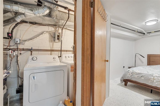474 Laurel Brook Dr, Brick, NJ 08724 - laundry area featuring washing machine and dryer and concrete block wall