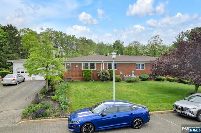 474 Laurel Brook Dr, Brick, NJ 08724 - single story home with a front yard, brick siding, and central AC