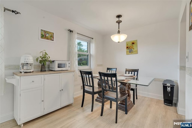 474 Laurel Brook Dr, Brick, NJ 08724 - dining room with light wood-type flooring and baseboards