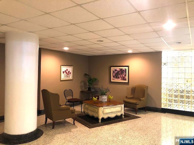 common area with recessed lighting and a drop ceiling