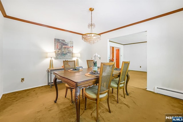 dining room with crown molding, carpet flooring, baseboards, a baseboard radiator, and a chandelier