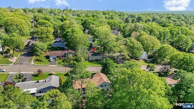 drone / aerial view of a heavily wooded area