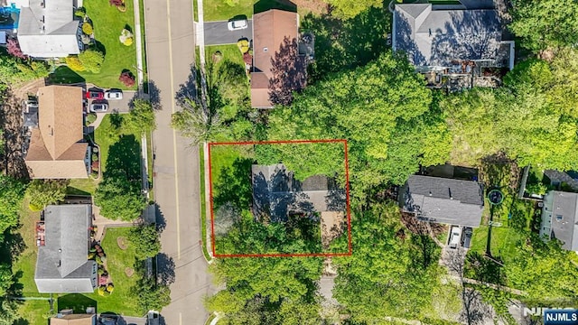 aerial view of residential area with property parcel outlined