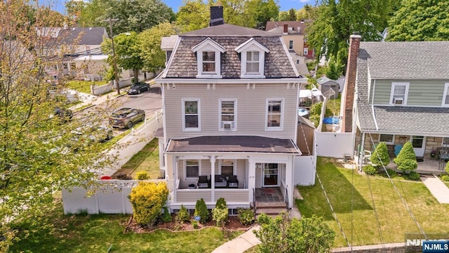 218 Waldo Pl, Englewood, NJ 07631 - view of front of home featuring a chimney and covered porch