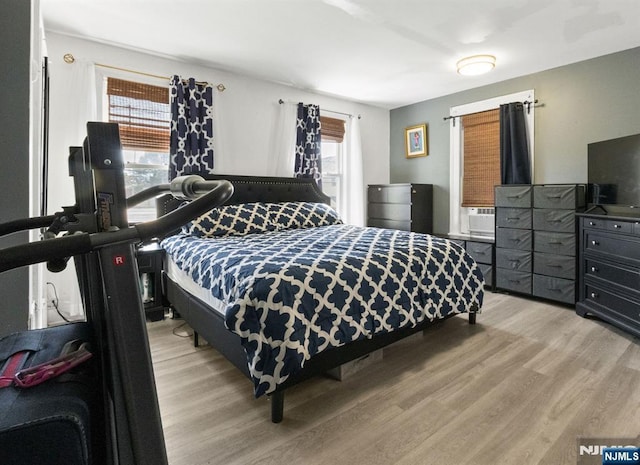 218 Waldo Pl, Englewood, NJ 07631 - bedroom featuring light wood-type flooring and cooling unit