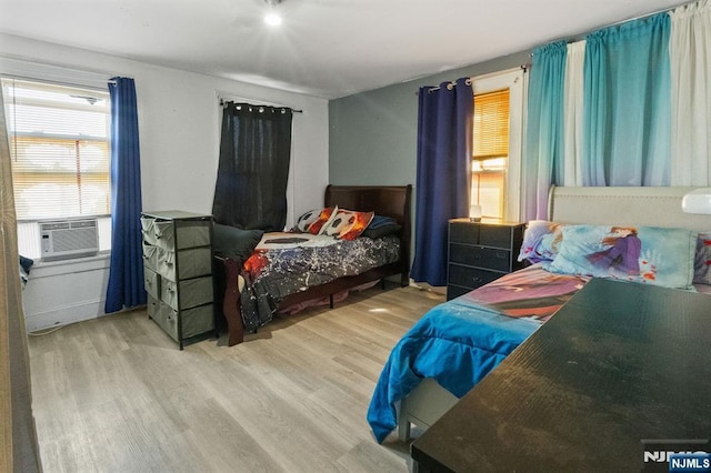 218 Waldo Pl, Englewood, NJ 07631 - bedroom featuring wood finished floors and cooling unit
