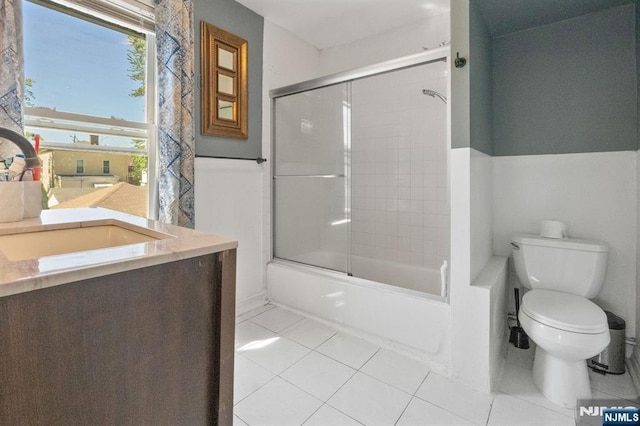 218 Waldo Pl, Englewood, NJ 07631 - full bath featuring tile patterned flooring, toilet, enclosed tub / shower combo, and a sink