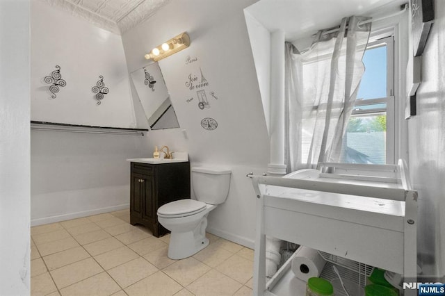 218 Waldo Pl, Englewood, NJ 07631 - bathroom with vanity, toilet, tile patterned floors, and baseboards