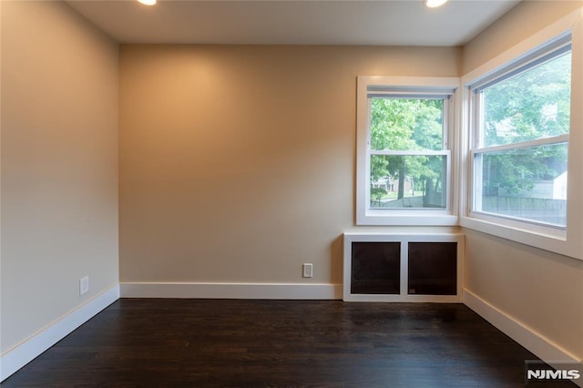 155 Liberty Rd, Teaneck, NJ 07666 - spare room with recessed lighting, dark wood-style floors, and baseboards