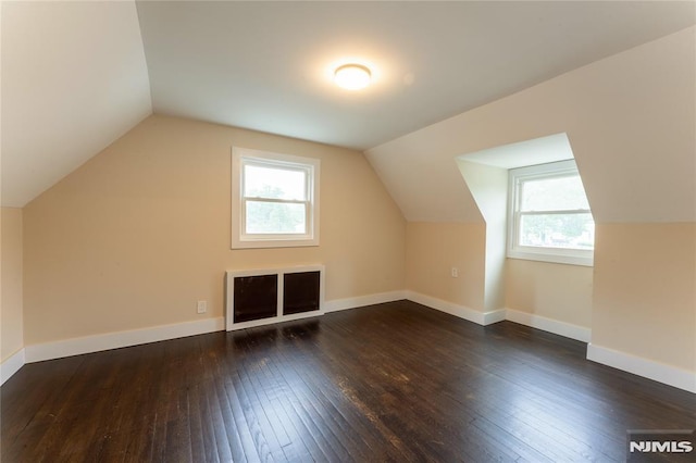 155 Liberty Rd, Teaneck, NJ 07666 - bonus room with hardwood / wood-style flooring, healthy amount of natural light, vaulted ceiling, and baseboards
