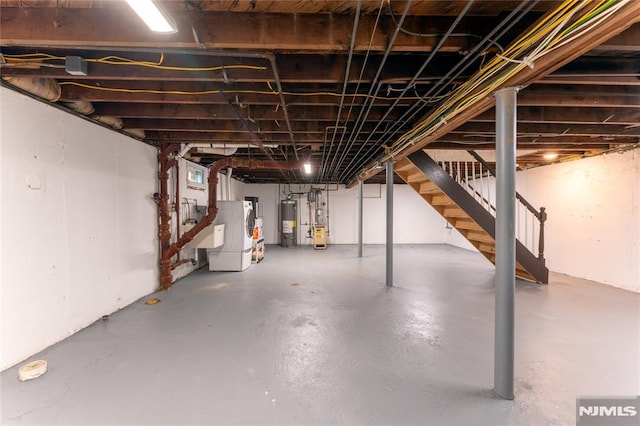 155 Liberty Rd, Teaneck, NJ 07666 - unfinished below grade area featuring stairs and water heater