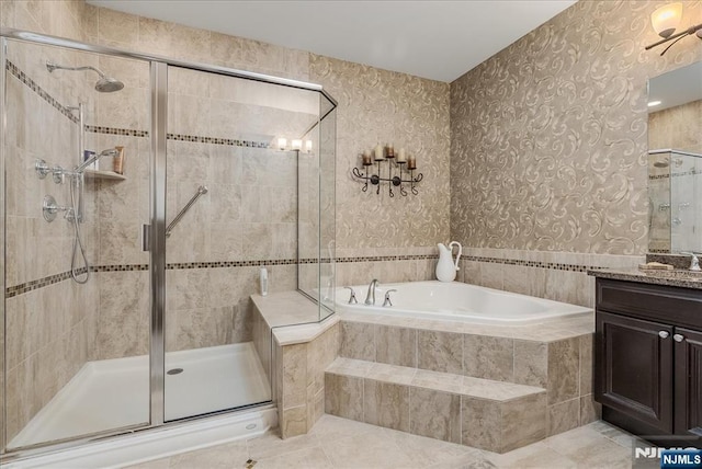 75 Windsor Ln, Ramsey, NJ 07446 - full bath with a garden tub, a shower stall, vanity, tile patterned floors, and wallpapered walls