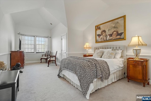 75 Windsor Ln, Ramsey, NJ 07446 - bedroom with vaulted ceiling and light colored carpet