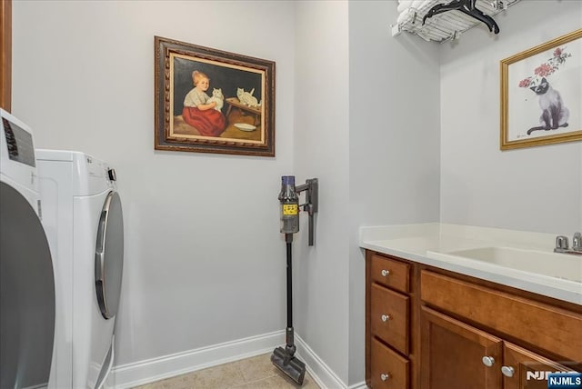 75 Windsor Ln, Ramsey, NJ 07446 - laundry room featuring baseboards, cabinet space, and washing machine and dryer
