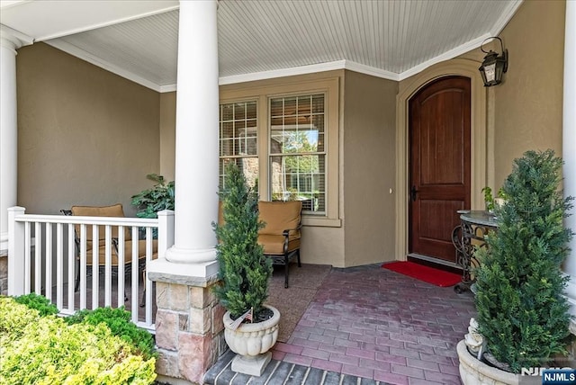 75 Windsor Ln, Ramsey, NJ 07446 - entrance to property featuring a porch and stucco siding