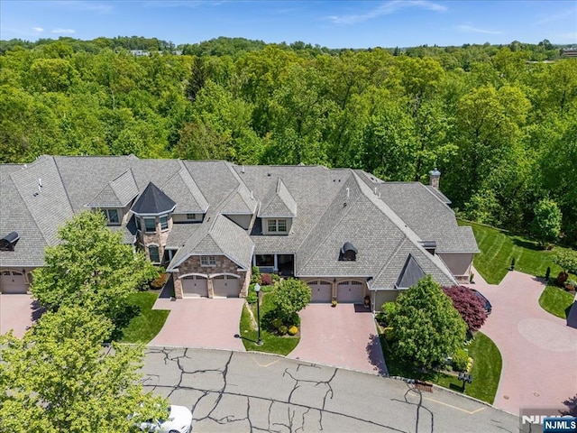 75 Windsor Ln, Ramsey, NJ 07446 - aerial view of property and surrounding area featuring a heavily wooded area