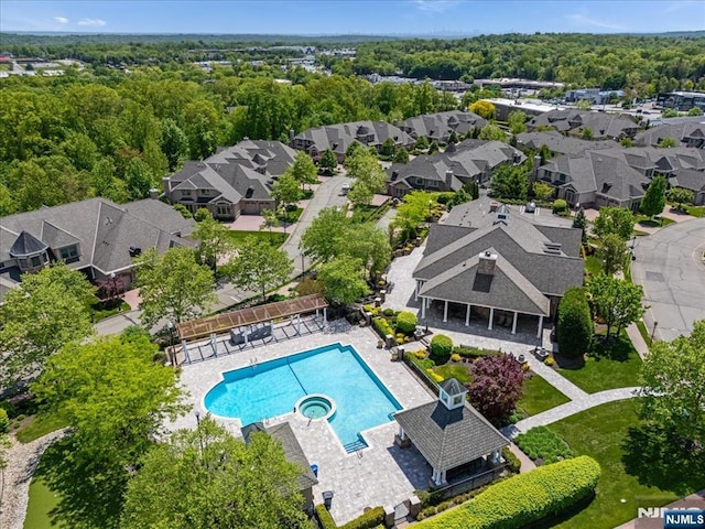 75 Windsor Ln, Ramsey, NJ 07446 - aerial perspective of suburban area with a pool area